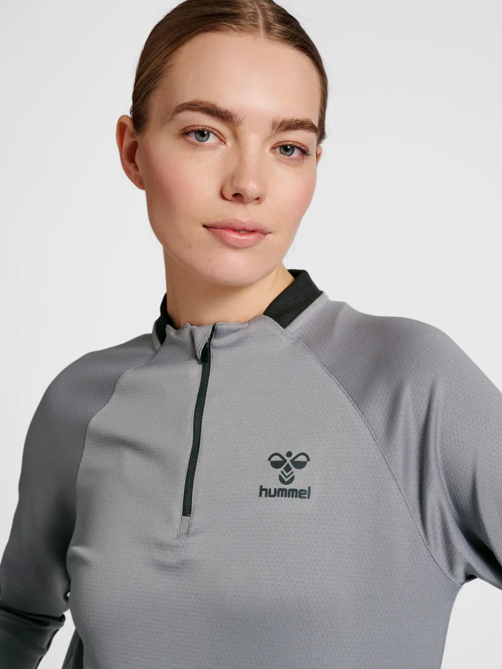 hmlGG12 ACTION HALF ZIP SWEAT WOMAN
