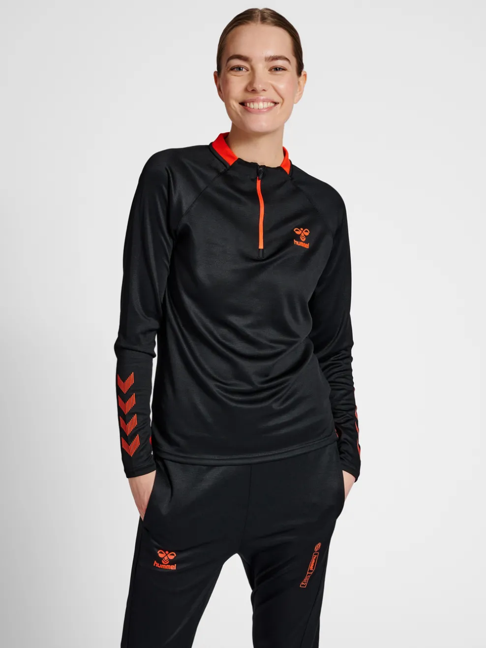 hmlGG12 ACTION HALF ZIP SWEAT WOMAN